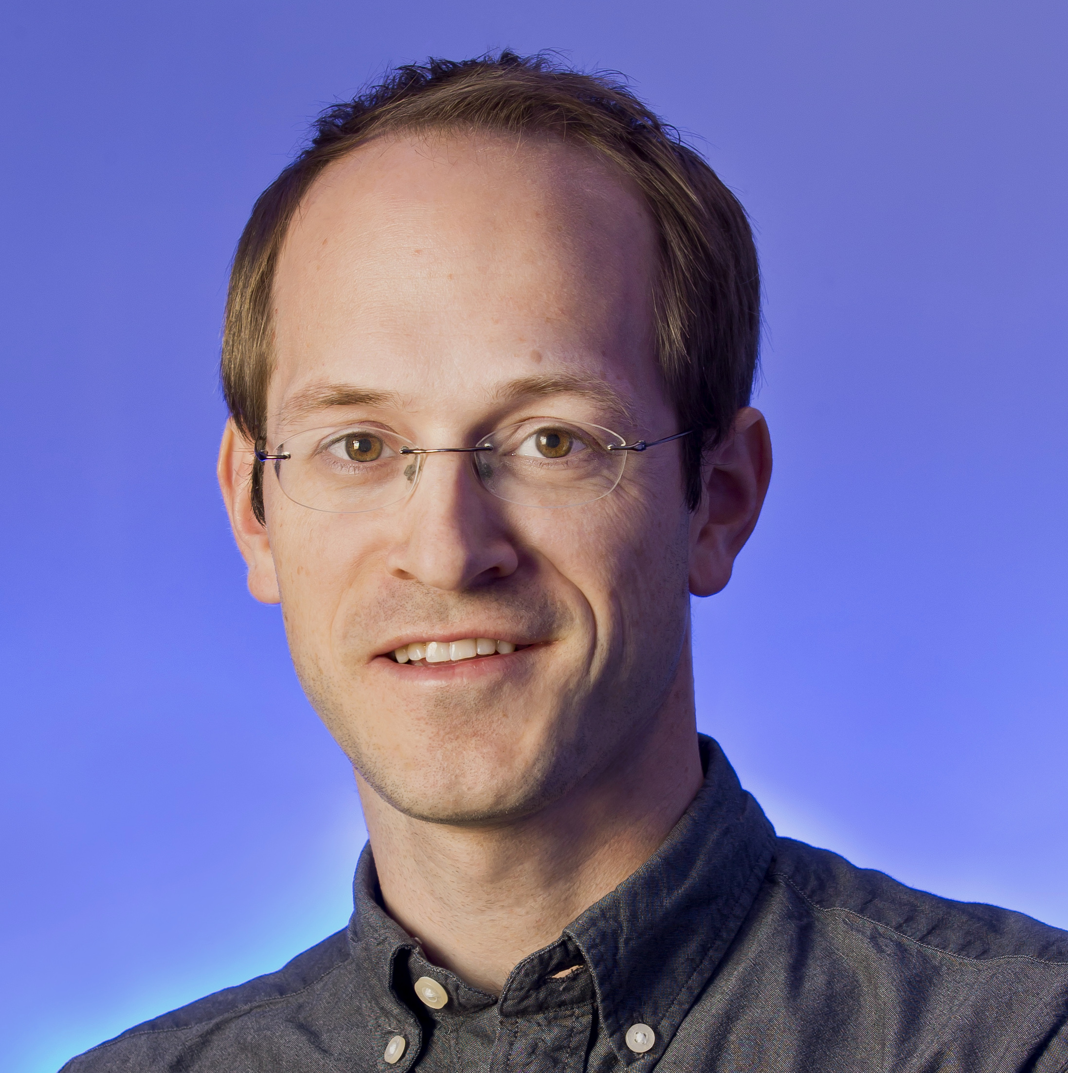 headshot of Andrew Childs