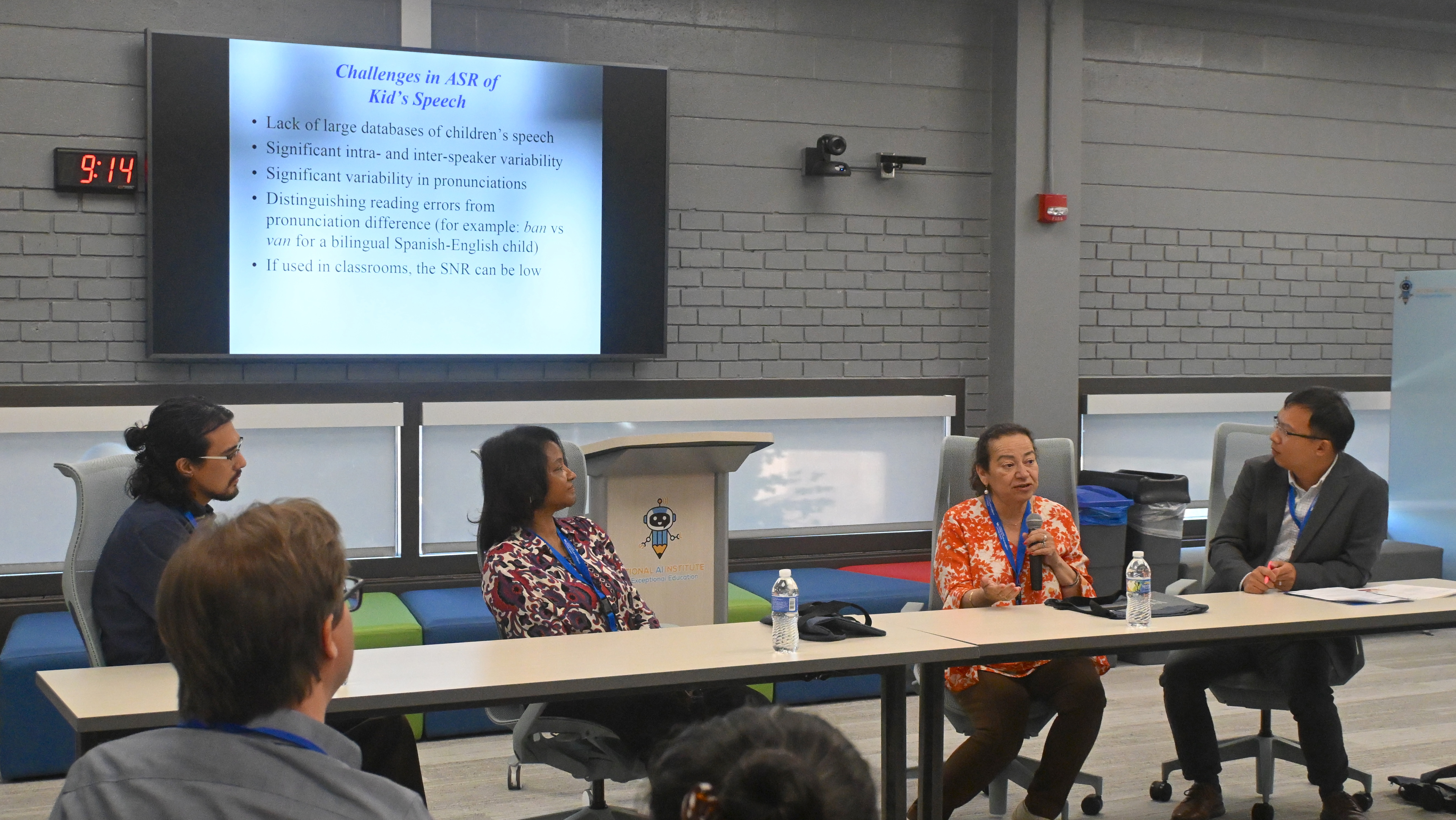 panel of four people talking to audience