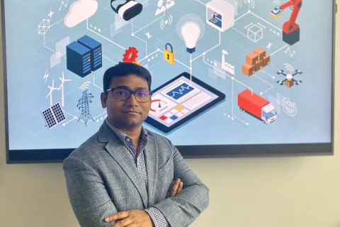 man standing in front of IOT devices