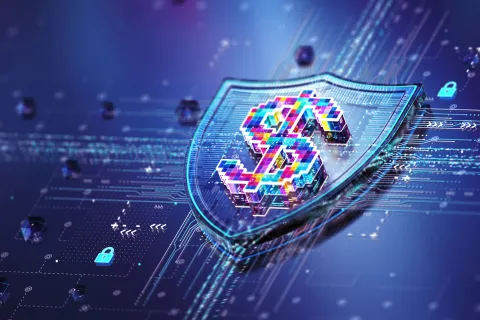 Colorful circuits form a dollar sign on a shield against a blue background