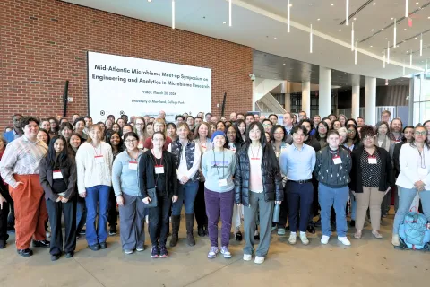 Group photo of attendees at the 10th annual Mid-Atlantic Microbiome Meet-up, held at the University of Maryland on March 20.