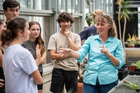 Stephanie Yarwood teaching in the research greenhouse. 