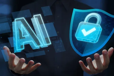 A person holding glowing blue digital icons of the letters "AI" in one hand and a protective security shield with a padlock in the other.