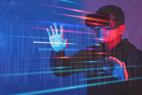 person wearing VR headset overlaid with brain wave signals