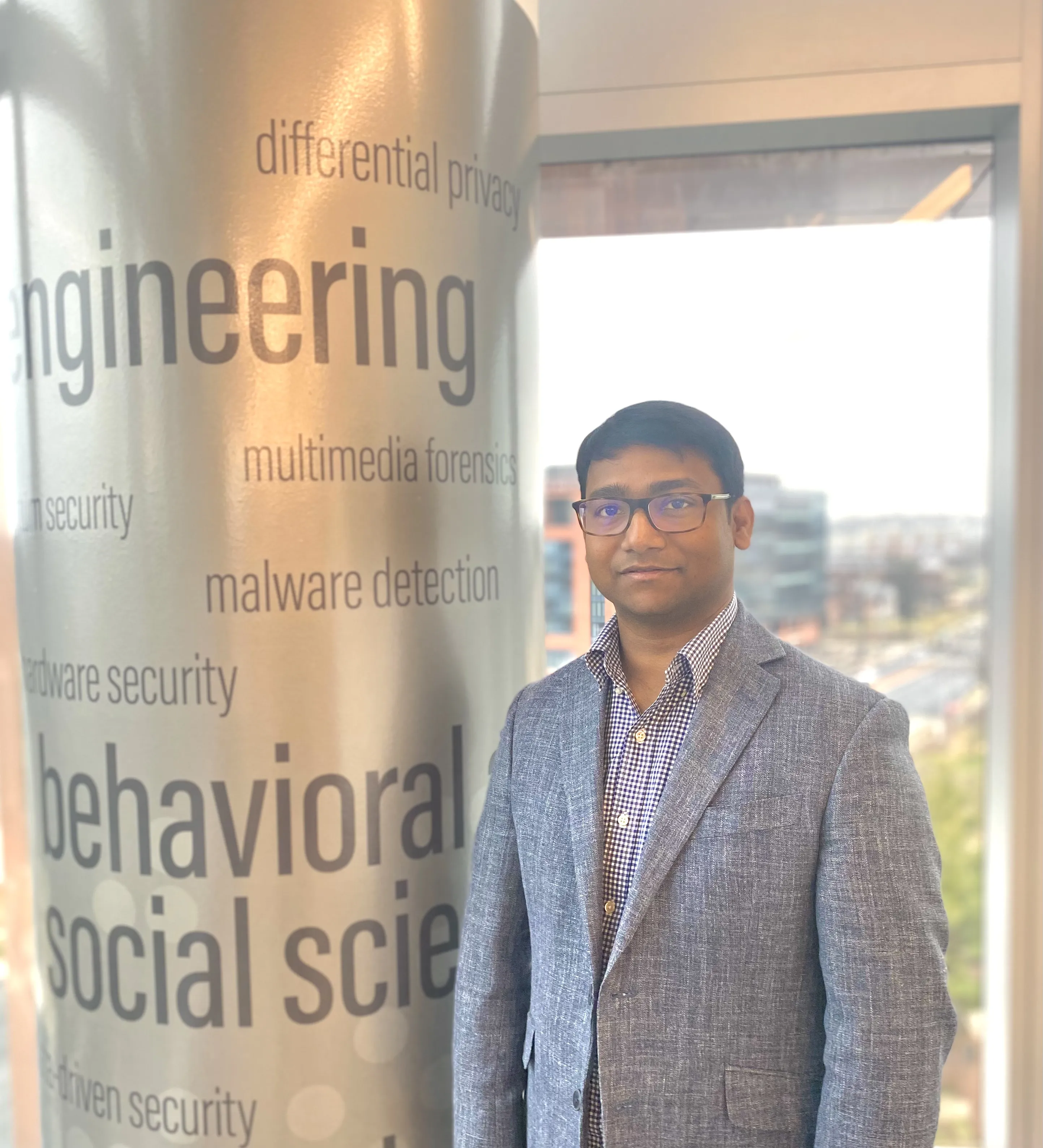 man standing by engineering buzzwords