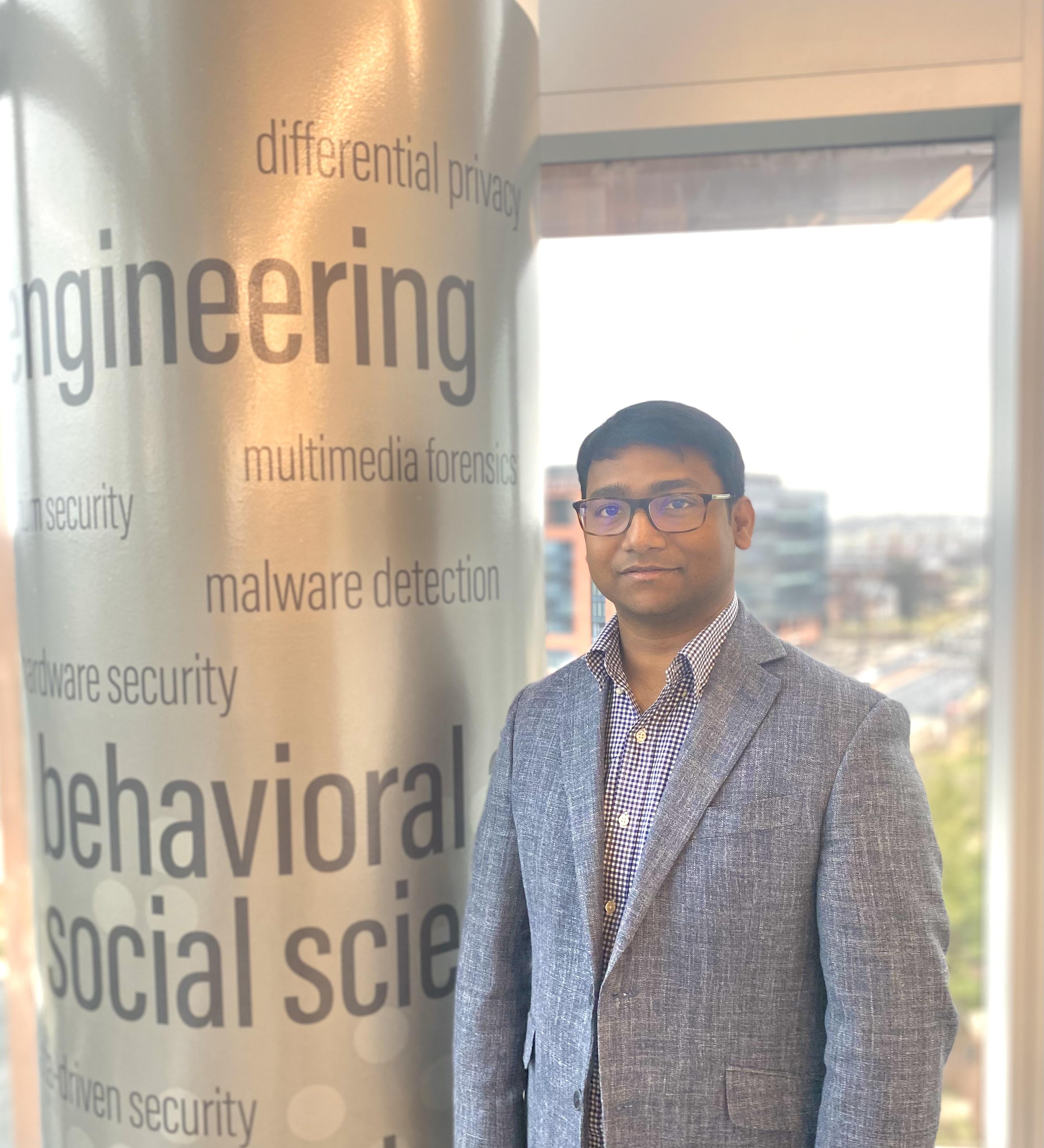 man standing by engineering buzzwords