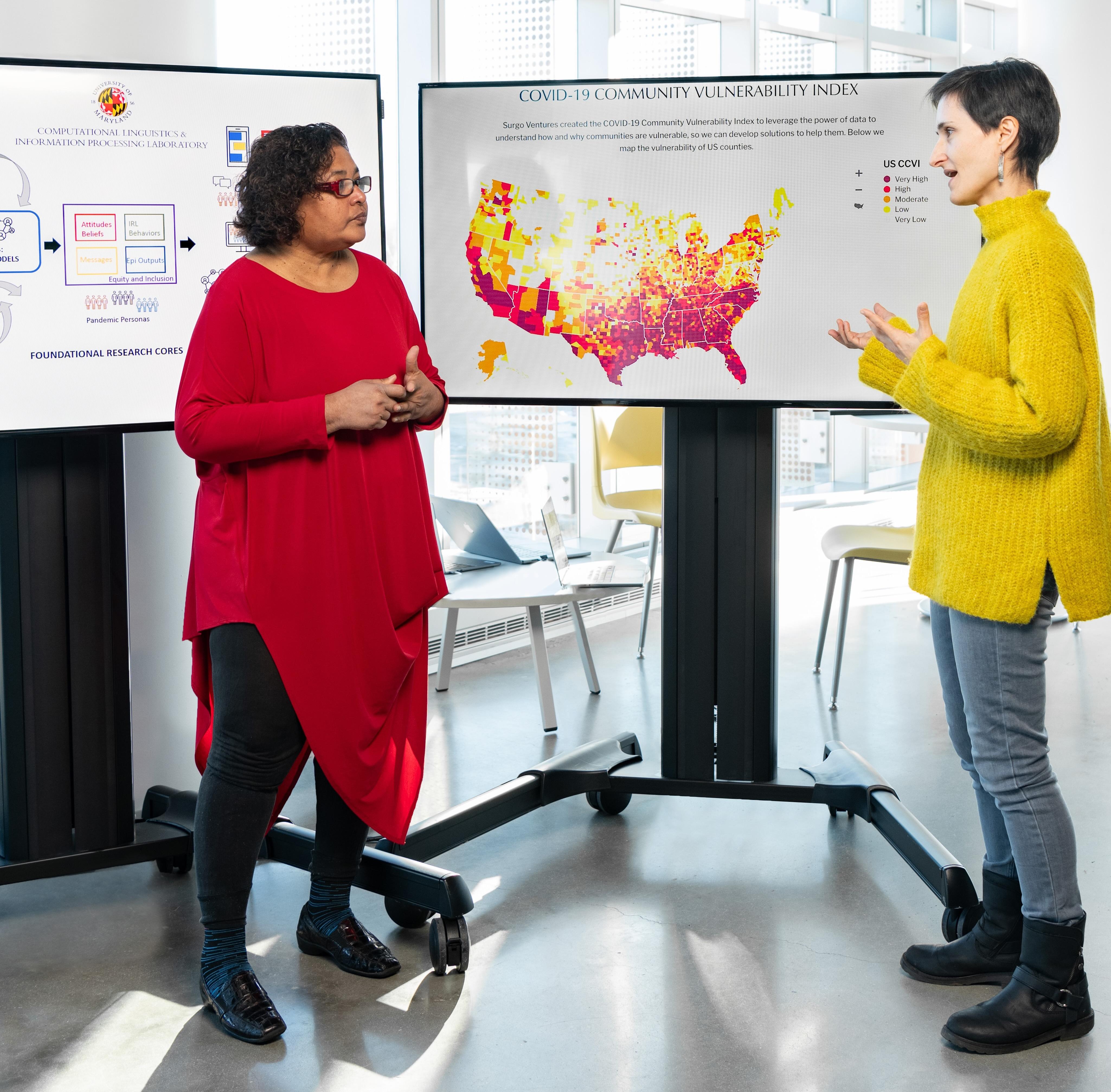 women discussing data