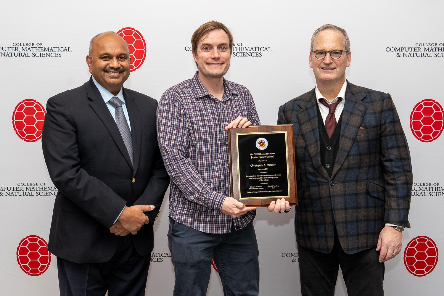 (From left) CMNS Dean Amitabh Varshney, Chris Metzler and CMNS Board of Visitors Chair Jeffrey Mechanick at the April 3 awards ceremony.