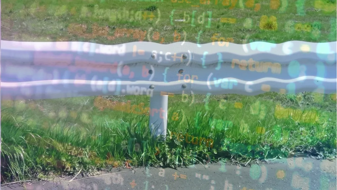 An image of a guardrail with computer code superimposed over it in blue and orange text.